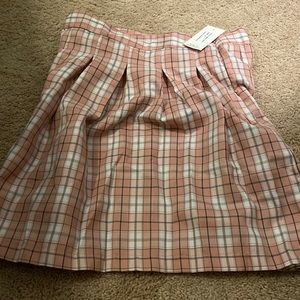 Pink,black and white skirt